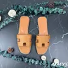 Slipisti designer vera pelle femminile sandali Oran sandali per estate in uscita per vacanza di lusso pannelli da spiaggia scarpe scarpate