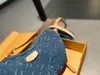 Bolso de guisante vintage de mezclilla Bolso de hombro de diseñador para mujer Bolso cruzado vintage Cartera de mano Estampado clásico Bolso de lona de mezclilla azul