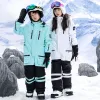 Dräkter vinterflickor pojkar skid jumpsuit snowboard overalls snowboard varm vindtät vattentäta barn skidkläder utomhus sportkläder