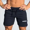 Pantaloncini da uomo Pantaloncini da fitness con doppia cerniera Pantaloncini da corsa da uomo Nuovi Pantaloni da allenamento fitness da uomo Pantaloncini da spiaggia traspiranti ad asciugatura rapida estivi Y240320