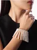 Bangle fflacell 2024 mode guldfärg imitation pärlor tofs öppna armband för kvinnor flickor party show charm metall smycken