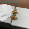 Branddesigner Western Empress Dowagerearring Stud Saturns Fashion Light Creative Brincos personalizados para mulheres