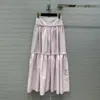 Spódnice moda słodkie damskie damskie 2024 Spring High talia Buttons Różowe paski Wzór Big Bottom Cute Maxi spódnica