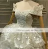 Vestido de novia de encaje floral de lujo 3D fuera del hombro