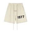 Versão correta da moda de linha dupla 1977 capris estampados flocados para homens e mulheres shorts esportivos casuais para casais