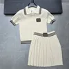 Gonne a pieghe lavorate a maglia da donna Polo Set da 2 pezzi Designer Lettera Maglieria Magliette Abito corto Moda due pezzi