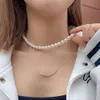 Mai lo stesso stile di collana di perle Shijia femminile americana avvolta in oro leggero, lusso semplice e versatile con catena alla clavicola