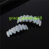 牙の形をしたグリルツ歯グリルゴールドシルバー2022新しいファッションブルーブラスジルコンボディジュエリー幾何学的ライトアップパーティージュエリー /