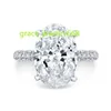 Anello di fidanzamento in moissanite Halo con diamanti a taglio ovale a 3 file di alta gioielleria con micro pavé di 8 ct
