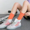 Chaussettes à Tube moyen pour femmes, style Hip-Hop, couleur unie, Punk, tricotées, à poils de rue, pour hommes