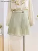 Spódnice Preppy Style Nieregularna mini plisowana spódnica z przyciskiem 2024 Letnie swobodne garnitury materiał Slim Krótkie ubrania