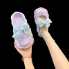 Kapcie nowe letnie kapcie kobiety Koreańska wersja Baotou Sofe Sole Cloud Buty urocze motyl Pvc Flip Flip Flops Chanclas Mjer