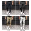 Calças masculinas Light Grey Mens Slim Fit Stretch Chino Calças Confortáveis ​​e Respiráveis ​​Perfeitas para Atividades Esportivas Diárias