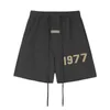 Versão correta da moda de linha dupla 1977 capris estampados flocados para homens e mulheres shorts esportivos casuais para casais