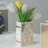 Luxe keramische gouden boekvaas Noord-Europese moderne bloemenvaastafelvaas bruiloft hydrocultuur kamer plantenvaas decoratie 240311