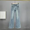 Kvinnors jeans europeisk stil strass för kvinnor förlängda byxor 2024 vår elastiska hög midja smala fit bootcut byxor