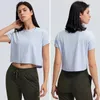 Chemises actives femmes Yoga haut ample Sport gymnase à manches courtes en cours d'exécution t-shirt séchage rapide Fitness t-shirts jure femme vêtements