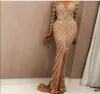 Yousef Aljasmi 2021 Robes de soirée sirène de luxe à manches longues Champagne pailletée sexy pure bijou cou avant fendu robes de bal Cus2934948