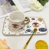 Tazze Nordic Ins Forma di occhio Tazza di caffè in ceramica Ornamenti Casa Soggiorno Cucina Tè pomeridiano Ufficio Set di piatti Artigianato