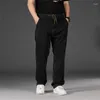 Jeans masculinos primavera perna larga homens retos pretos calças grandes cintura elástica plus size 44 42 40
