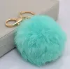 2024 hoge kwaliteit echt konijnenbont bal sleutelhanger zachte haarbal mooie gouden metalen sleutelhangers bal pom poms pluche sleutelhanger auto sleutelhanger tas oorbellen accessoires met doos