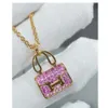 Lyxsmycken hemes halsbandspåse halsband hänge med rosa diamant pläterad 18k rosguld kelly väska krage kedja