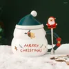 Tazze Simpatica tazza da caffè in ceramica natalizia per bambini Kawaii pupazzo di neve Babbo Natale tazza da tè al latte con coperchio e cucchiaio Idee regalo per amici adulti