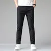 Été pantalons décontractés hommes mince affaires Stretch mince taille élastique survêtement coréen classique noir gris bleu pantalon mâle 240305
