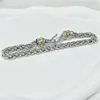 DY Hook Twisted Wire Buckle Bracelet in Sterling Silver with 14K Yellow Plated 240315