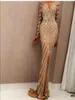 Yousef Aljasmi 2021 Mermaid Evening Dresses Luxury Long Sleeve Champagne Sexy Sexy Geyer Jewel Neck Drity Prom Volts Cus8933959