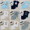 Moda Criança Jumpsuits coloridos Impressão de padrões recém-nascidos tamanho 73-110 Camiseta infantil de verão Conjunto de mangas curtas e shorts 24mar