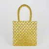 Cordon Ins Style tissé à la main or et argent conception creuse sac à bandoulière pour femme Simple décontracté perlé sacs à main d'été pour les femmes