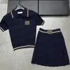 レディースニットプリーツスカートポロシャツ2PCSセットデザイナーレターニットTシャツショートドレスファッション2ピース