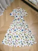 ヨーロッパのファッションコンステレーショングラフィティアニマルエレメントハイクラシックスモールフリップカラーウエストクロージングデザインドレス