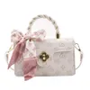L'usine vend des sacs à main de créateurs de marque en ligne à 55% de rabais sur le nouveau sac à tendance pour femmes douce et écharpe à épaule rose Emed Square