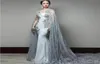 2020 Nowe sukienki wieczorne syreny z koronkową peleryką Sheer Batau Scyk z koralikami plus size Formal Sukienka Zamiatek Satin Prom Go3249373