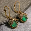 Pendientes colgantes Vintage libélula de bronce para mujer, moda de Color dorado, patrón de talla de Metal con incrustaciones de piedra lunar multicolor