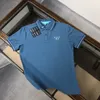 Patrón de triángulo de diseñador masculino Polo para hombres Polo de alta calidad de color sólido de alta calidad.