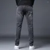 Mäns jeans 2024 Slim Straight Fashion Korean Elastic Cotton Four Seasons Denim Trousers Brand Clothing Classic Black Grey