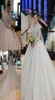 Urocze Dubaj Arabskie suknie ślubne z koronkowymi cekinami z koralikami Sexy Backless Backless Court Train Tiulle Squult Wedding Bridal Go4646269