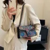 Borsa da donna transfrontaliera all'ingrosso di marca di moda Borsa da donna Nuova moda stampata a tre colori con catena a spalla piccola multifunzione quadrata