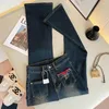 Jean femme Vintage américain bleu cloche bas taille haute poches déchirées jambe large Stretch Streetwear pantalon droit