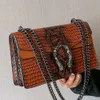 Grenzüberschreitende Großhandelshandtaschen der Modemarke Neue Damentasche Modekette Straddle Krokodilmuster Vielseitige One-Shoulder-Ladybags