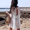 Costume da bagno a mezza manica con mini abito da spiaggia oversize ricamato in pizzo con copricostume