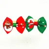 ملابس الكلاب 100pc/Lot Christmas Bows Santa Snowman Cat Hair Grooming Associory Holiday Pet Supplies