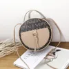 Totes Round Designer Vintage Scrub Leather Crossbody Bag For Women Pu axelväskor Damer Små handväskor Mini Tote