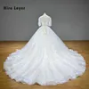 Embauchez Lnyer V-Neck Half Sleve Pearls Crystal Flowers Appliques Lace Princess Ball Robes de mariée Robes de mariée 100% Bureau Vidéo