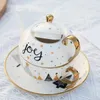 Set di articoli da tè Tè in ceramica da 420 ml per un set Natale Babbo Natale Teiera Tazza piattino Placcatura in oro Maniglia tazza Confezione regalo