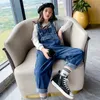 Småbarnflicka Jumpsuit Fashion Solid Color Jeans Overalls For Kids Teenage Cotton Suspenders Kläder Lossa barn denim Romper 240305