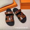 Tofflor sandaler kohude linje platt botten tjock andra farbror strand fula skor unisex